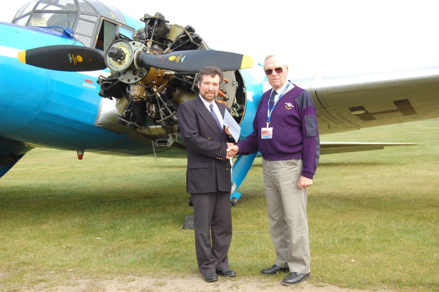 Steve Harper receiving his Honorary Life Membership of the Shuttleworth Veteran Aeroplane Society Ken Cox OBE